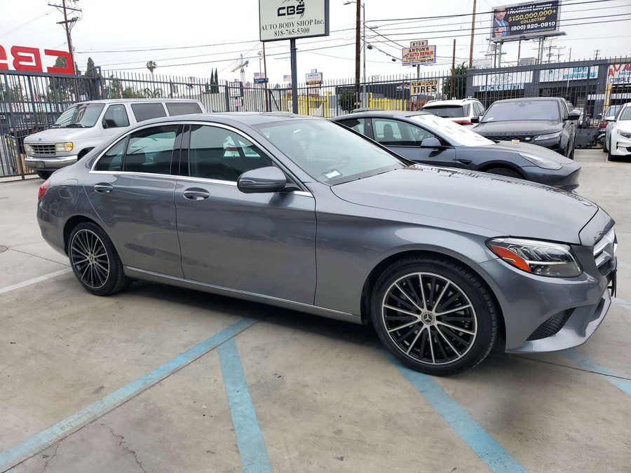 Finished gray Mercedes-Benz C-Class outside CBS Auto Body